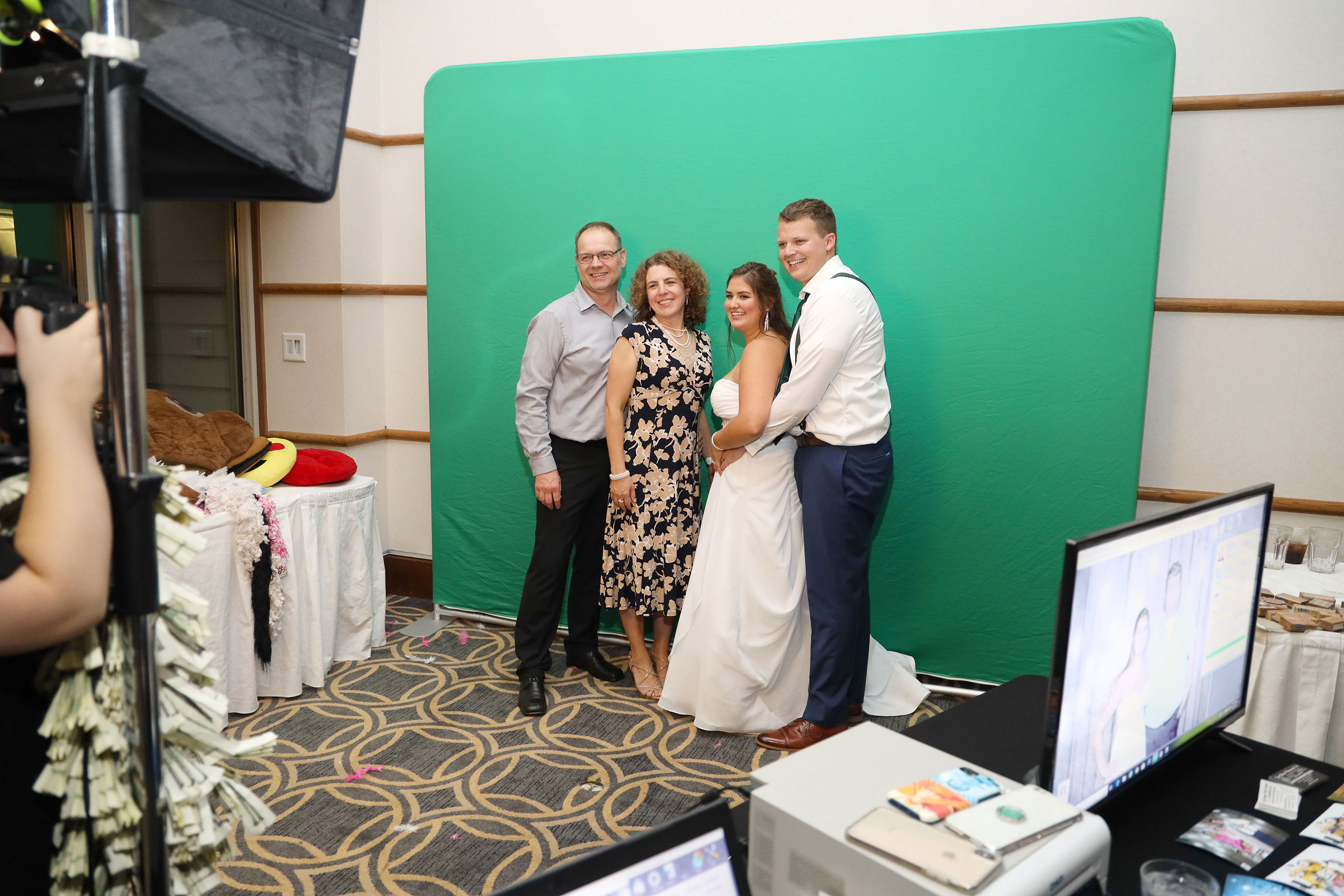 Toledo Green Screen Photo Booth being used by Wedding Guests at Maumee Bay State Park Resort and Lodge