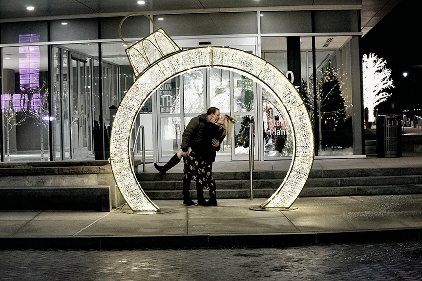 holiday proposal captured by Kurt Nielsen Photography taken in downtown Toledo at Promenade Park near ProMedica's Headquarters