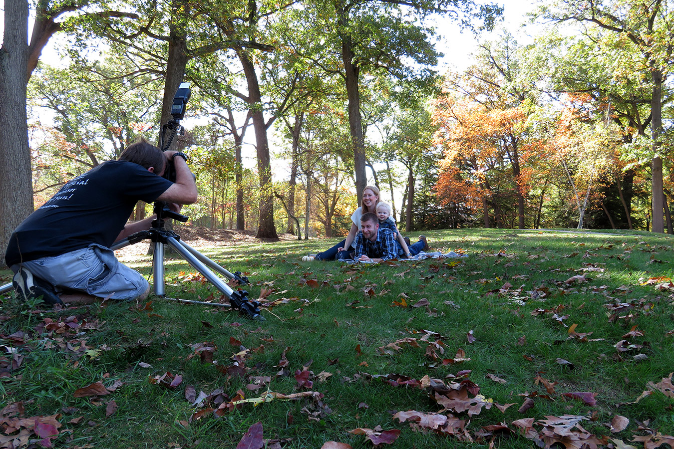 Kurt Nielsen of Kurt Nielsen Photography photographing a family at Wildwood Metropark